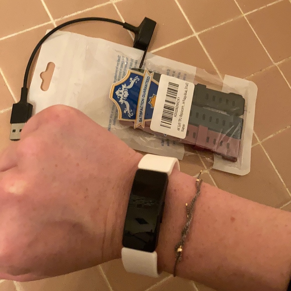 NWOT black Apple fit bit watch